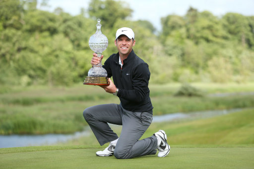 Paul Casey celebrates on the18th green with the trophy during day four of the Irish Open at Carlton
